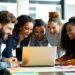 A 20diverse 20team 20collaborating 20around 20a 20laptop 2c 20show
